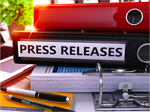 binders with the words press release